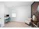 Bright home office with neutral carpet, light-colored walls, and built-in desk space at 196 River Bank Rd, Fuquay Varina, NC 27526