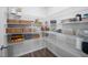 Walk-in pantry with white wire shelving for optimal storage solutions at 196 River Bank Rd, Fuquay Varina, NC 27526