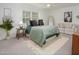 Serene bedroom with cozy bed, soft carpet, and natural light, perfect for relaxation and rest at 2 Banbury Ln # 2, Chapel Hill, NC 27517