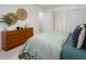 Spacious bedroom features a large bed, dresser, and ample storage, creating a comfortable retreat at 2 Banbury Ln # 2, Chapel Hill, NC 27517
