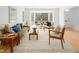 Bright living room with hardwood floors, a bay window, and stylish furnishings for a cozy atmosphere at 2 Banbury Ln # 2, Chapel Hill, NC 27517