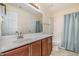 Cozy bathroom featuring sink with lots of counter space and combination bath and shower at 211 Richmond Run, Stem, NC 27581
