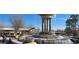 Ornate tiered water fountain sits in a landscaped setting near an outdoor cafe at 213 Lord Byron Ct, Cary, NC 27513