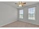 Comfortable bedroom with neutral carpet and ceiling fan at 233 Stone River Dr, Wendell, NC 27591