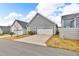 Charming home with a two-car garage and a private driveway at 233 Stone River Dr, Wendell, NC 27591