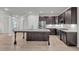 Gourmet kitchen featuring stainless steel appliances, granite counters, and a center island at 233 Stone River Dr, Wendell, NC 27591