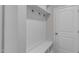 Bright mudroom with built-in bench and storage hooks at 233 Stone River Dr, Wendell, NC 27591