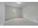Neutral bedroom with carpet, window, and fresh paint ready for your personal touch at 2629 Sweetgum Dr, Apex, NC 27539