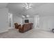 Expansive bonus room with comfortable seating arrangements, media area, and natural light at 2629 Sweetgum Dr, Apex, NC 27539