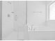 Bathroom featuring a glass-enclosed shower, soaking tub, and modern fixtures at 270 Trailing Bluff Way, Garner, NC 27529