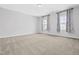 Bright and spacious empty bedroom with plush carpeting and natural light at 270 Trailing Bluff Way, Garner, NC 27529