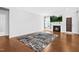 Bright living room features a fireplace, wood floors, and an open layout at 270 Trailing Bluff Way, Garner, NC 27529