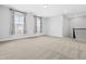 Upstairs empty loft area with carpet, natural light, and plenty of space at 270 Trailing Bluff Way, Garner, NC 27529