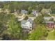 An aerial shot showing the house with a backyard deck at 2832 Steeple Run Dr, Wake Forest, NC 27587