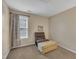 Bedroom with chair and ottoman and natural light at 2832 Steeple Run Dr, Wake Forest, NC 27587