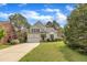 Charming two-story home with a manicured front lawn, attached garage and lovely curb appeal at 2832 Steeple Run Dr, Wake Forest, NC 27587