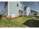 Well-maintained backyard with a screen porch and privacy fence at 304 Rivella Dr, Wake Forest, NC 27587