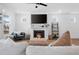 Inviting living room featuring a modern fireplace and contemporary decor at 304 Rivella Dr, Wake Forest, NC 27587