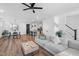 Spacious open-concept living room and dining area with modern furnishings at 304 Rivella Dr, Wake Forest, NC 27587