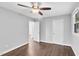 This bedroom has neutral colored walls and hardwood flooring at 3332 Apache Dr, Raleigh, NC 27609