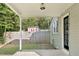 The covered back patio and yard with privacy fencing at 3332 Apache Dr, Raleigh, NC 27609
