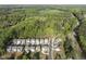 Beautiful aerial view of a well-planned community surrounded by lush greenery and trees at 430 Wyndham Dr, Chapel Hill, NC 27516