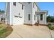 Charming home with a two-car garage, neutral siding, and a well-manicured lawn at 430 Wyndham Dr, Chapel Hill, NC 27516