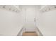 Well-organized mudroom featuring bench seating, hooks, and shelving for convenient storage at 430 Wyndham Dr, Chapel Hill, NC 27516