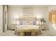 Bright bedroom with a neutral palette, stylish bedside tables, and a unique wooden bench at 456 Barnes Landing Dr # 39, Four Oaks, NC 27524