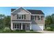 Charming two-story home with a welcoming front porch and attached garage at 456 Barnes Landing Dr # 39, Four Oaks, NC 27524
