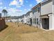 A view of the backyard of this modern townhome at 486 Autumn Rain St, Cary, NC 27519