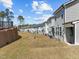 Exterior of townhomes showing backyard view at 486 Autumn Rain St, Cary, NC 27519