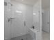 Modern bathroom featuring a glass-enclosed shower with white subway tile at 486 Autumn Rain St, Cary, NC 27519