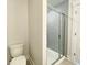Modern bathroom featuring tiled shower with sliding glass doors at 486 Traditions Grande Blvd # 28, Wake Forest, NC 27587