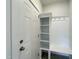 Convenient mud room with built-in shelving and a coat rack, offering storage and organization at 486 Traditions Grande Blvd # 28, Wake Forest, NC 27587