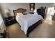 Bedroom with upholstered headboard, side tables, and chest of drawers at 502 Willowmere Ct, Cary, NC 27513