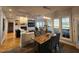 Breakfast nook featuring a table with modern chairs and a view of the living room at 502 Willowmere Ct, Cary, NC 27513