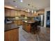 Kitchen with granite countertops, stainless steel appliances, tile backsplash, and ample cabinet space at 502 Willowmere Ct, Cary, NC 27513