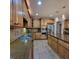 Kitchen with granite countertops, stainless steel appliances, tile backsplash, and ample cabinet space at 502 Willowmere Ct, Cary, NC 27513