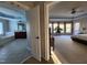 View of the main bedroom and bath, featuring a tray ceiling, jacuzzi tub, and double vanity at 502 Willowmere Ct, Cary, NC 27513
