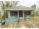 Charming home featuring a quaint front porch and a classic roofline, presenting a cozy curb appeal at 537 Homeland Ave, Durham, NC 27707