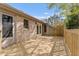 A wooden backyard deck, offering an inviting outdoor living space with a white brick home at 5500 Fortunes Ridge Dr # 72A, Durham, NC 27713