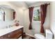 Bathroom has wood-look floors and a sink with a wood cabinet at 5500 Fortunes Ridge Dr # 72A, Durham, NC 27713