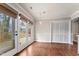 Dining area with hardwood floors, a door to an outdoor deck, and a closet for storage at 5500 Fortunes Ridge Dr # 72A, Durham, NC 27713