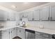 Kitchen featuring stainless steel appliances, white subway tile backsplash, and light-colored granite countertops at 5500 Fortunes Ridge Dr # 72A, Durham, NC 27713
