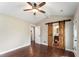 Main bedroom with wood-look floors and an en suite bathroom at 5500 Fortunes Ridge Dr # 72A, Durham, NC 27713