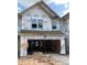Exterior view of a home under construction with Kingspan GreenGuard at 6002 Shade Tree Ln, Durham, NC 27703