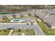 The aerial view shows the community pool, parking, and amenity area at 667 Ashley Woods Dr, Gibsonville, NC 27249