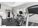 Community gym featuring cardio equipment and multiple ceiling fans for comfortable workouts at 667 Ashley Woods Dr, Gibsonville, NC 27249