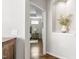 Hallway with hardwood floors featuring a built-in display niche with decorative accents at 667 Ashley Woods Dr, Gibsonville, NC 27249